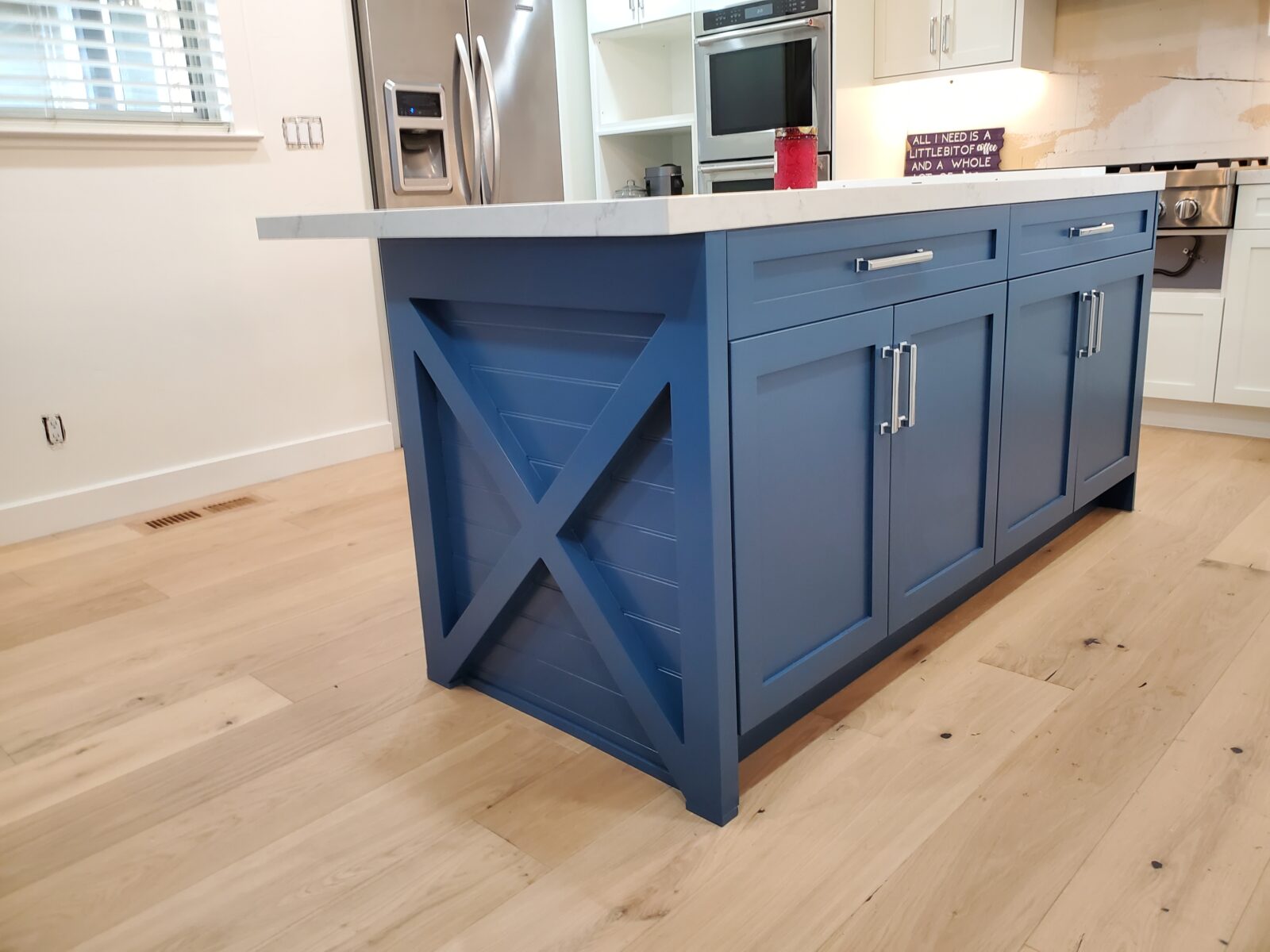 Shaker style door kitchen island. Blue cabinets. Custom kitchen island.