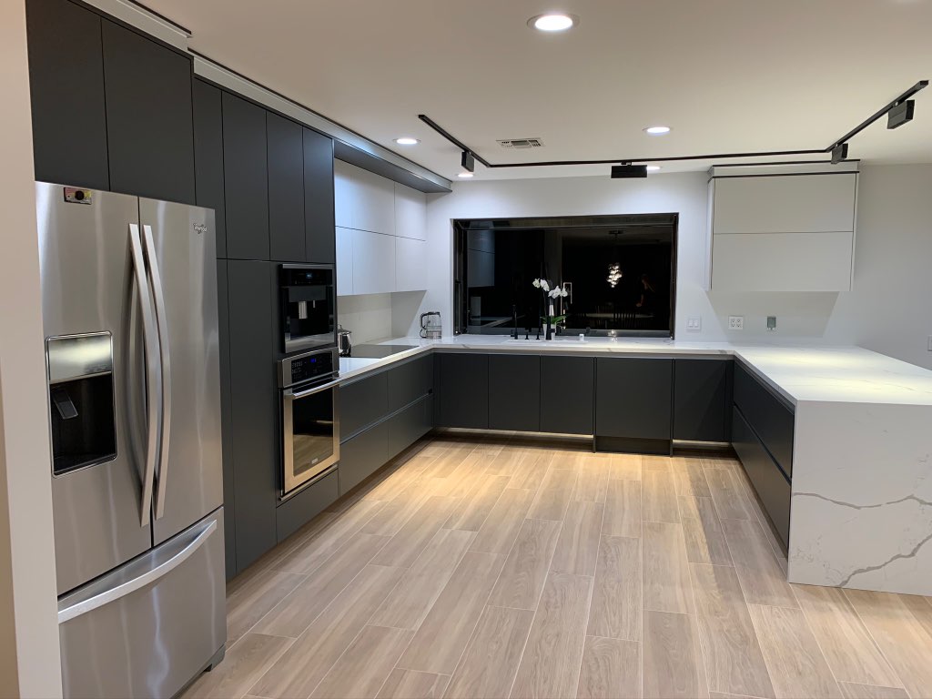 Super Matt surface kitchen. Marble and black cabinets. Miralax.