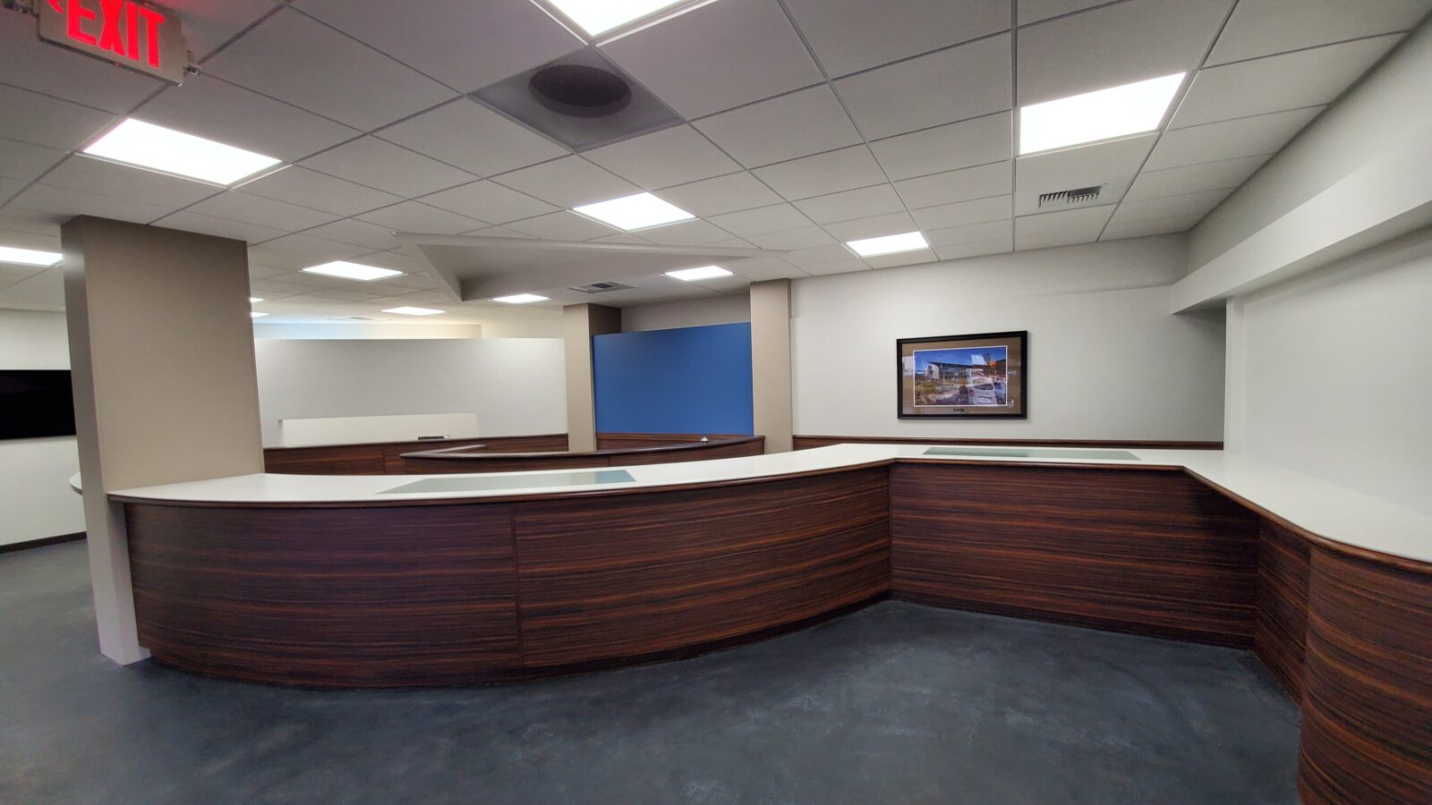 Modern reception area counter top. Commercial counter top office space. Corian counter top solid surface.