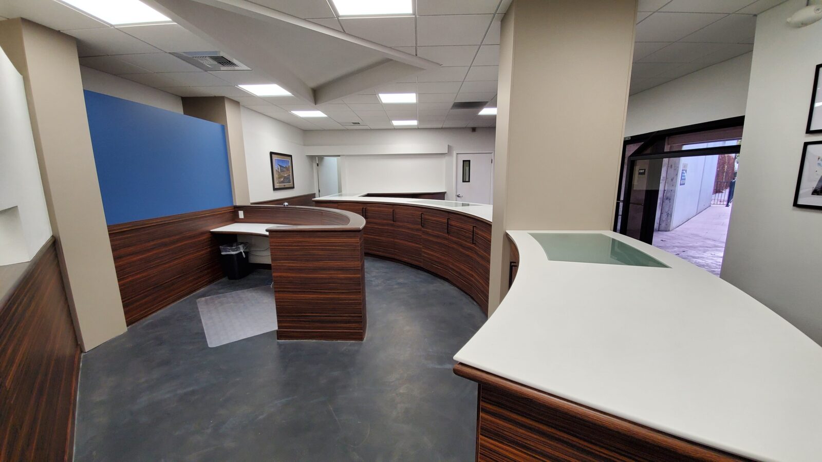 Modern reception area counter top. Commercial counter top office space. Corian counter top solid surface.