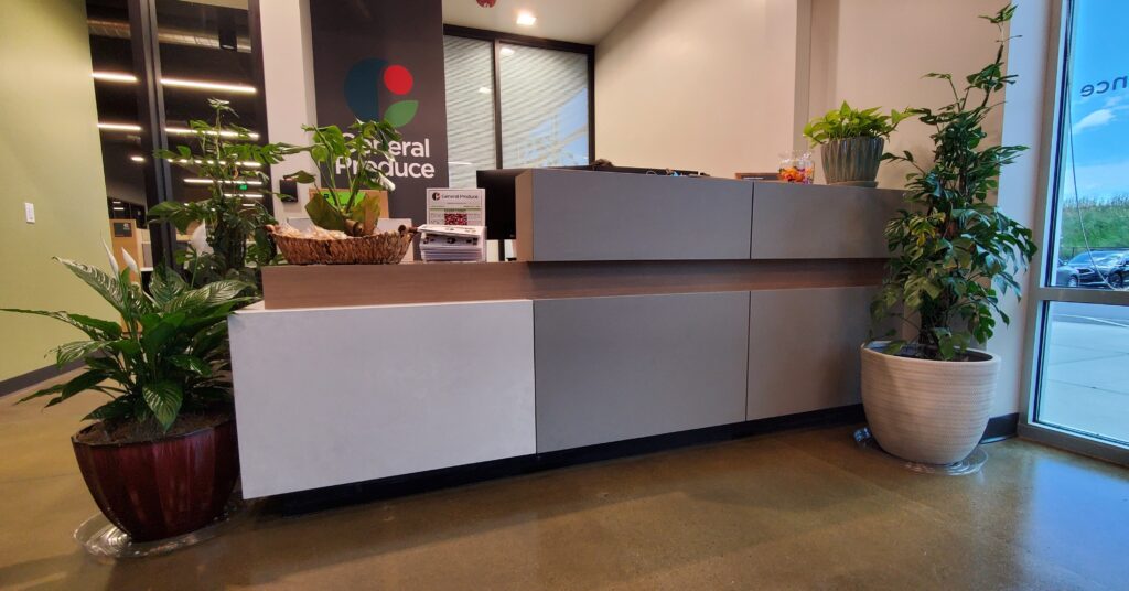 Reception front desk. office reception. Custom texture contemporary counter tops.